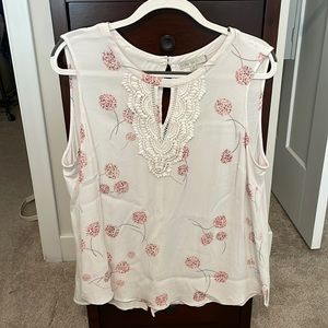 Sleeveless top with pink flowers and lace detail on back. 2X